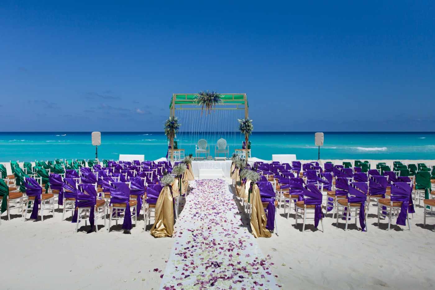 Altar in terrace for wedding ceremony by the sea and letters LOVE in the background at the Hotel Gra