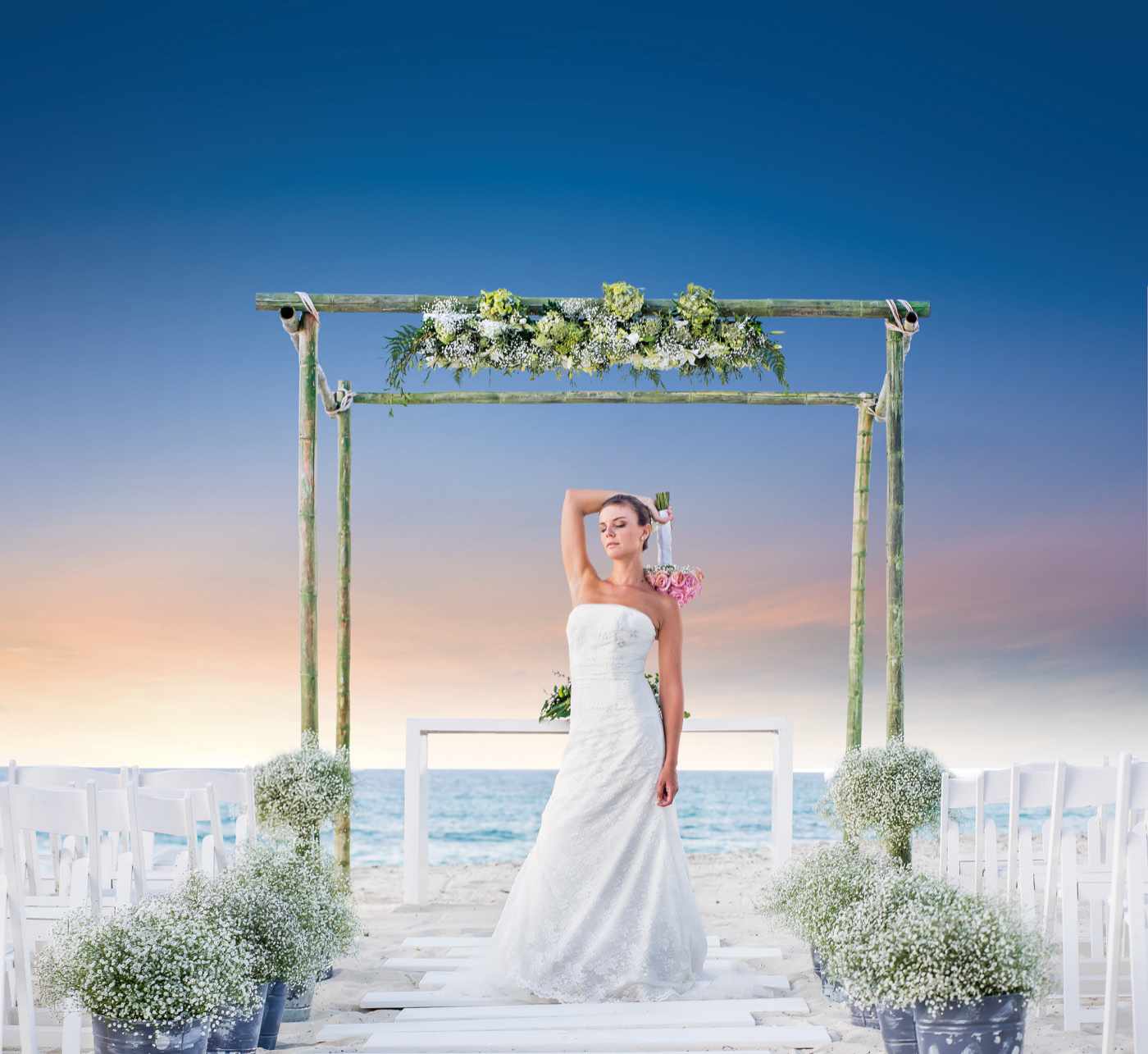 Terrace altar with red flower decoration and branches by the sea at the Grand Oasis Cancun Hotel