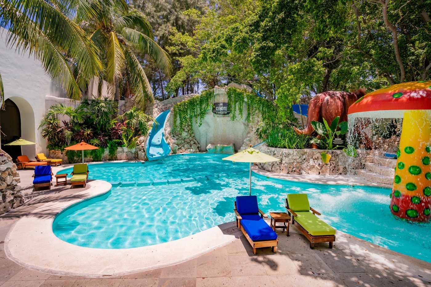 Playground at KiddoZone with consoles and puff armchairs at Hotel Grand Oasis Palm